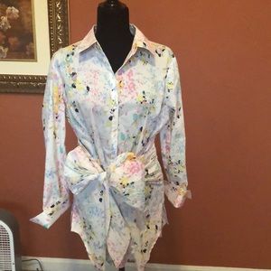 Button down blouse with paint splatter print.